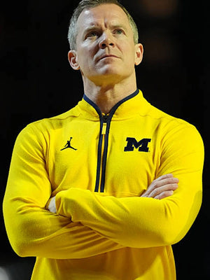 Recreated Michigan Wolverines Coach Dusty May Victory quarter-zip pullover jacket in yellow with sleek athletic design and clean team detailing