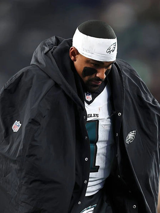 2025 Philadelphia Eagles black sideline cape coat with Jalen Hurts-inspired oversized design and structured shoulders.