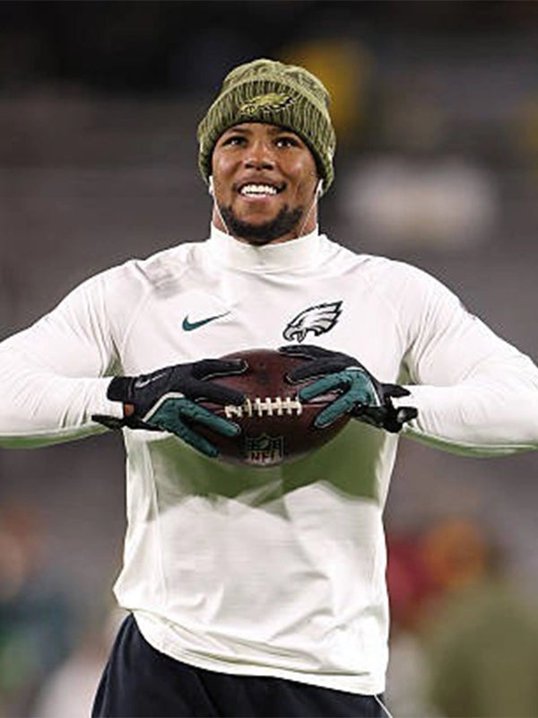 Recreated Eagles vs Packers game T-shirt featuring Saquon Barkley in off-white long sleeves by Nike.