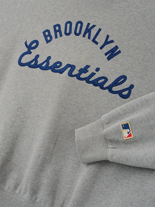 Jackie Robinson Day Essentials Fear of God Grey Oversized Pullover Hoodie with minimalist branding and premium cotton blend