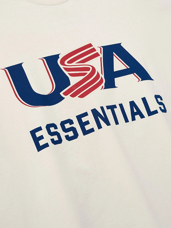 RECREATED Fear of God Essentials 2026 USA Baseball White Unisex T-Shirt combining smooth fabric construction with sporty graphic aesthetics