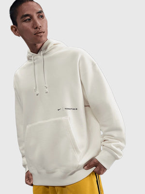 Nike by TOGETHXR “Everyone Watches” pullover hoodie for women featuring soft fleece and classic pullover fit
