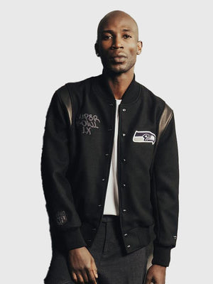 Black artisan jacket honoring the Seahawks’ Super Bowl LX victory with Fanatics x APEXER co‑branding and fine crafted details