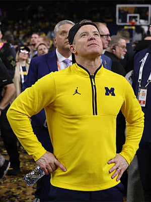 Michigan Wolverines Victory pullover jacket recreated in yellow with quarter-zip closure and versatile athletic wear appeal
