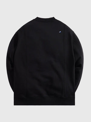 RECREATED Kith x ADER error 2026 Semi-Oversized Black Sweatshirt showcasing a soft fleece build with contemporary layered street aesthetics