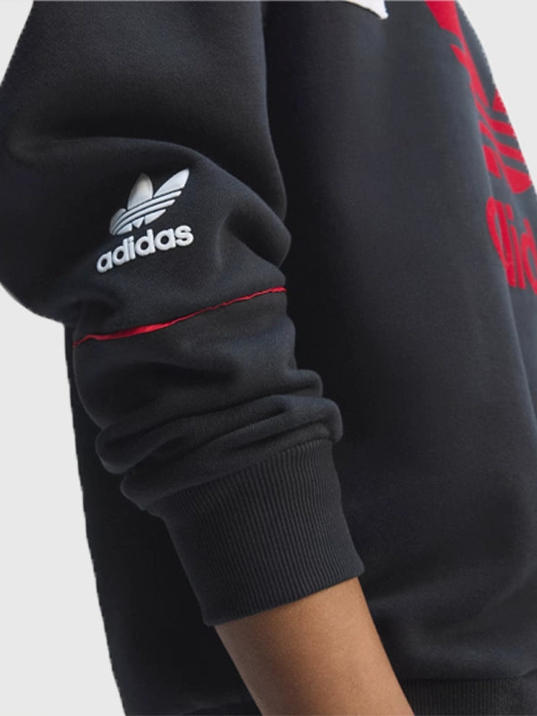 Manchester United 90s Crewneck Sweatshirt featuring iconic season-inspired graphics and comfortable everyday wear feel