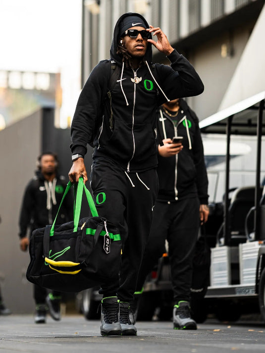 Recreated Ducks 2025 Nike black hoodie featuring a smooth full-zip front and college graphics.