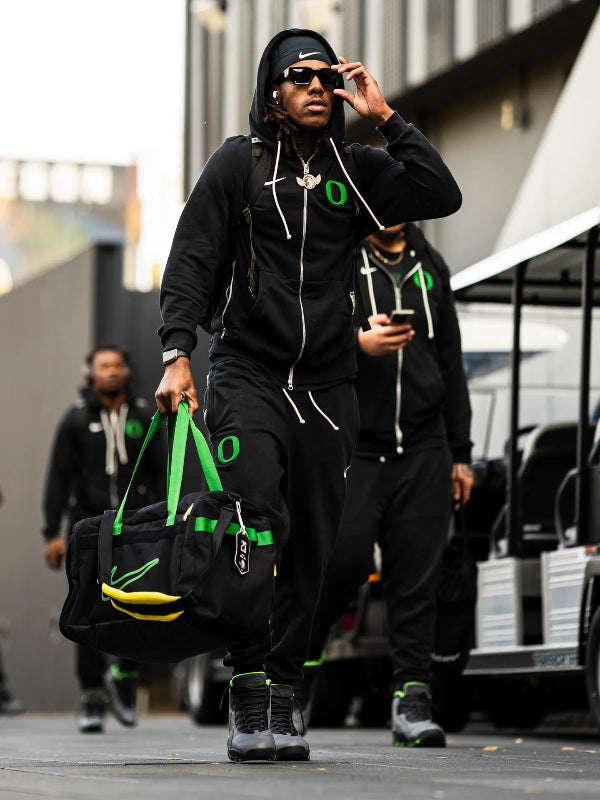 Recreated Ducks 2025 Nike black hoodie featuring a smooth full-zip front and college graphics.