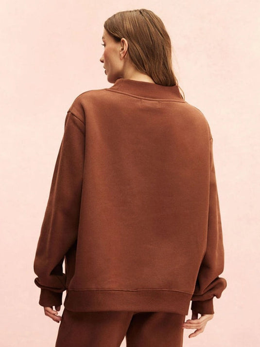 Monochrome varsity-style mockneck fleece sweatshirt from Parke 2026 featuring a structured yet relaxed fit