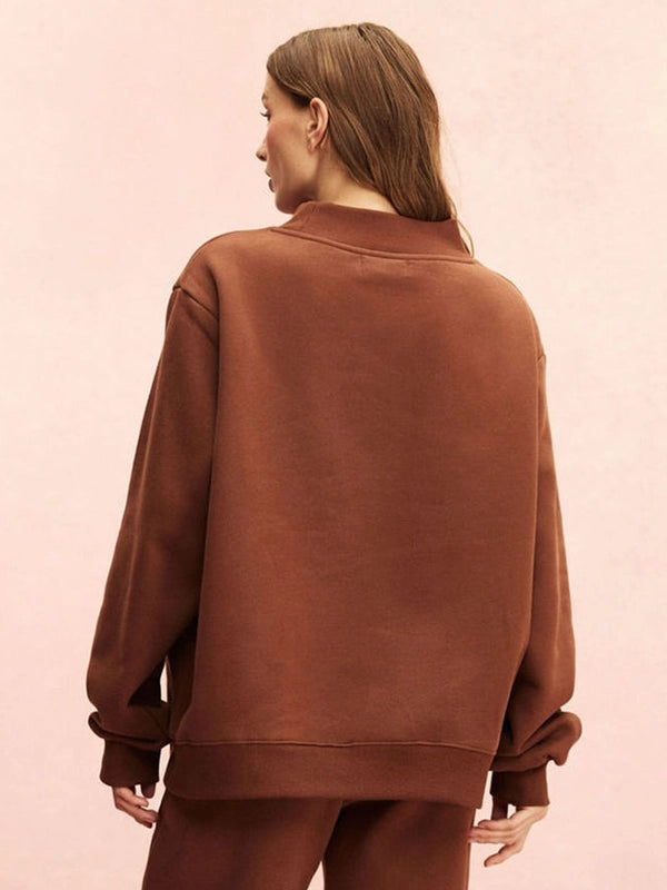 Monochrome varsity-style mockneck fleece sweatshirt from Parke 2026 featuring a structured yet relaxed fit
