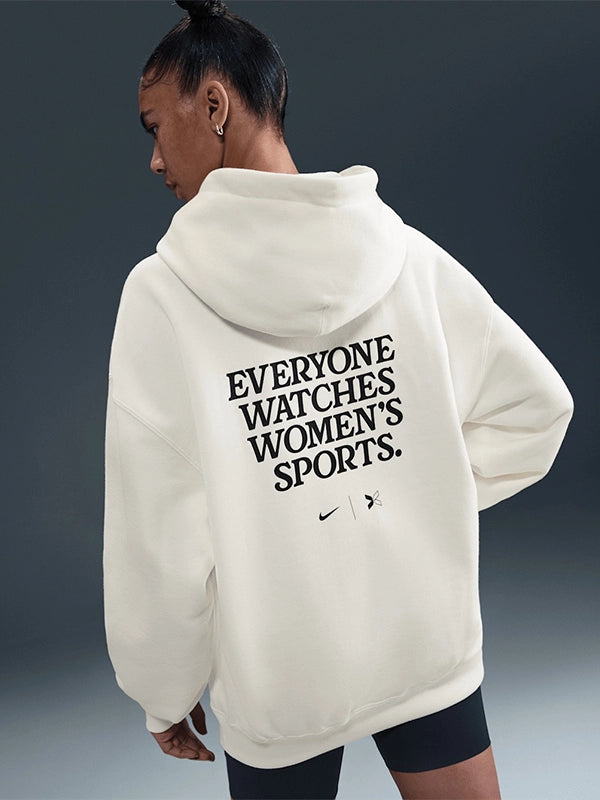 Nike Everyone Watches women’s fleece hoodie in pullover style with casual, relaxed silhouette