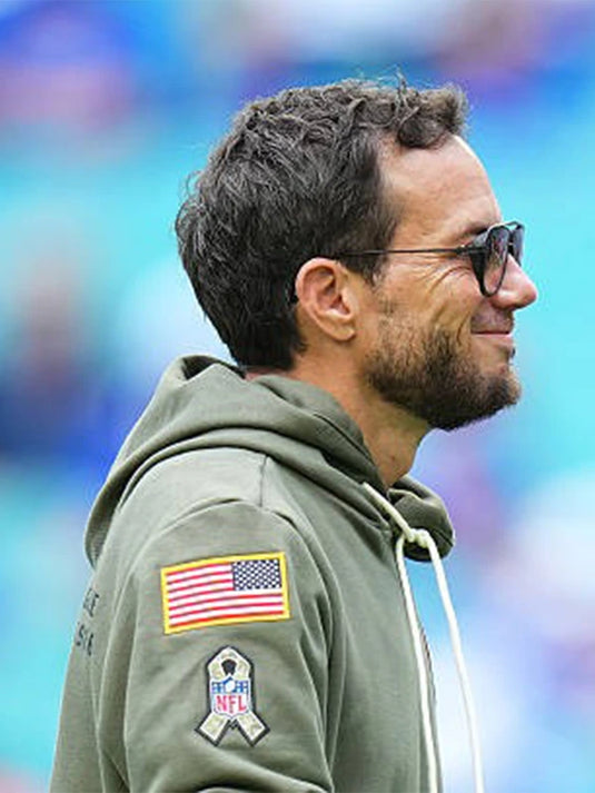 Olive green Miami Dolphins Salute to Service 2025 fleece hoodie designed for comfort and patriotic team style.