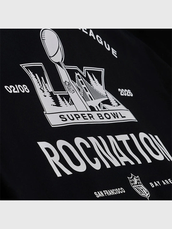Black fleece pullover hoodie recreated from the Roc Nation x Paper Planes 2026 Super Bowl LX drop with structured fit and standout branding.
