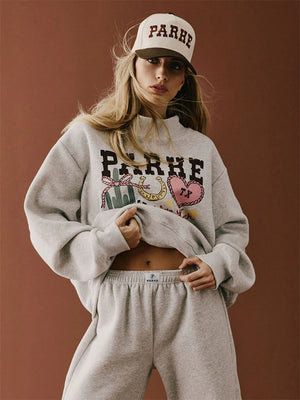 Recreated Parke Texas Graphic Mockneck Fleece Sweatshirt in Grey featuring bold front graphic and soft fleece fabric.