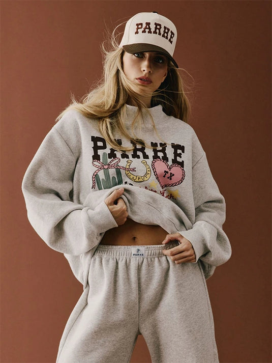 Recreated Parke Texas Graphic Mockneck Fleece Sweatshirt in Grey featuring bold front graphic and soft fleece fabric.