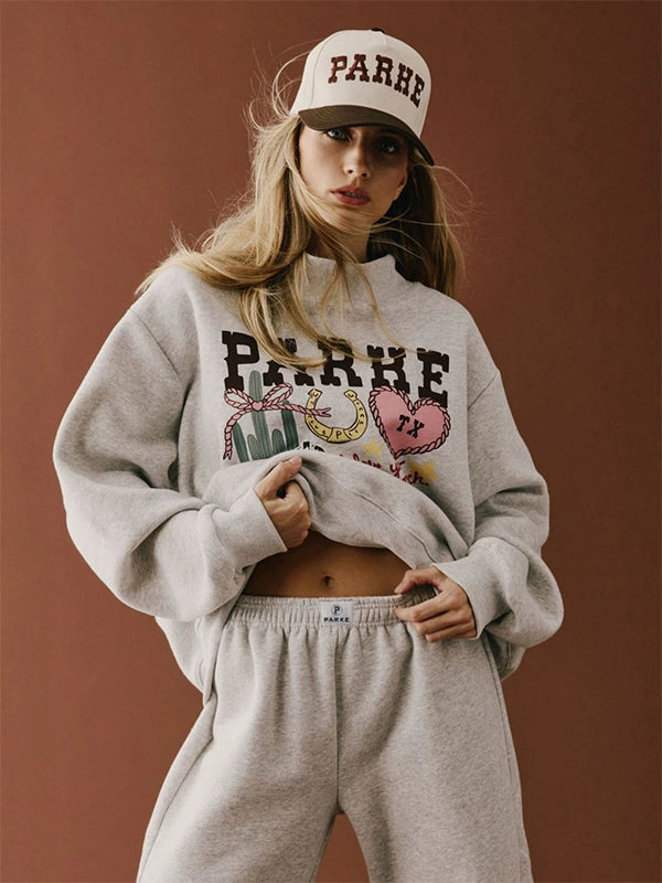 Recreated Parke Texas Graphic Mockneck Fleece Sweatshirt in Grey featuring bold front graphic and soft fleece fabric.