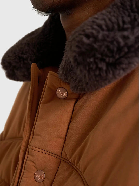 Wrangler Stranger Things S05 brown parachute puffer jacket capturing Jim Hopper’s signature utilitarian style