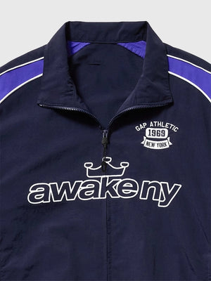 RECREATED Gap × Awake NY 2026 Oversized Full Zip Track Jacket showcasing a relaxed structure with contemporary athletic styling