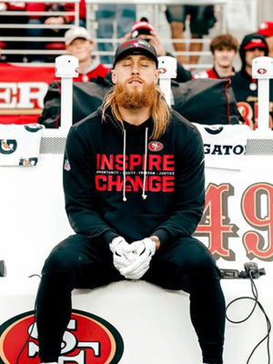 San Francisco 49ers 2025 Inspire Change black Nike sideline hoodie inspired by George Kittle with Opportunity Equity Freedom Justice lettering