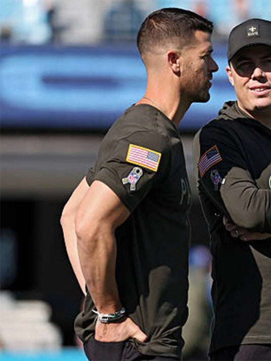 Nike forest green Carolina Panthers 2025 Salute to Service Sideline Primary Edge T-shirt combining style and functional Dri-FIT technology.

