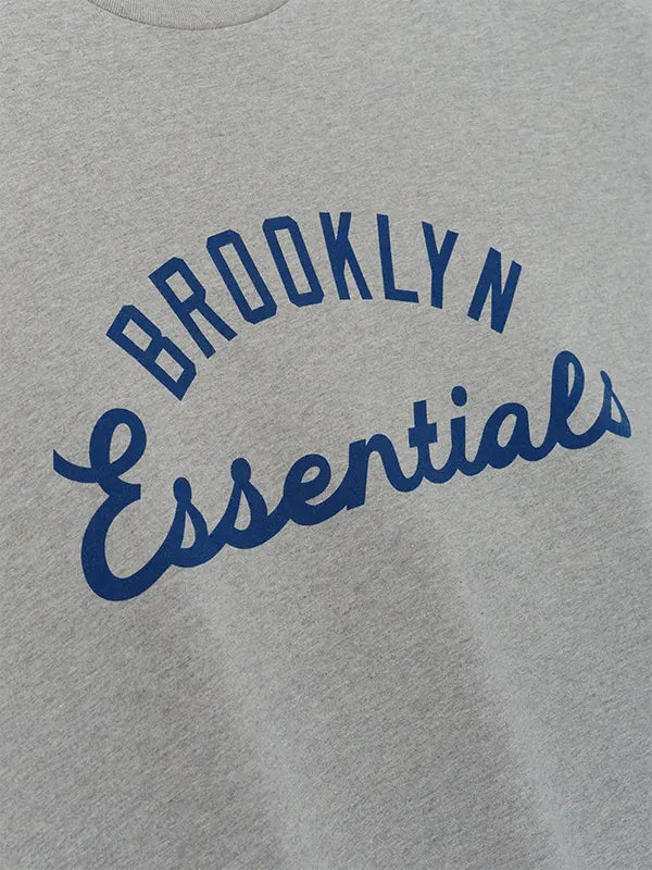 Jackie Robinson Day Essentials Fear of God Grey Oversized T-Shirt with minimalist branding and smooth jersey feel