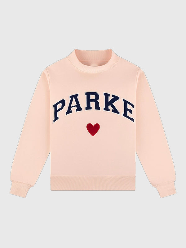 RECREATED Parke Valentine’s 2026 drop heart varsity mockneck fleece sweatshirt in pink with a soft brushed finish