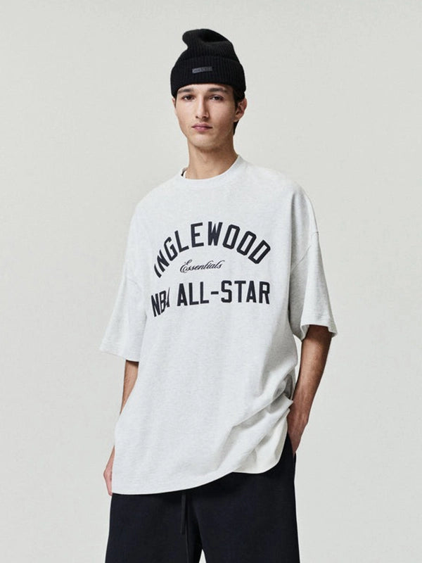 Recreated grey All Star Weekend ’26 90s tee by Essentials Inglewood with classic crew neck and graphic front