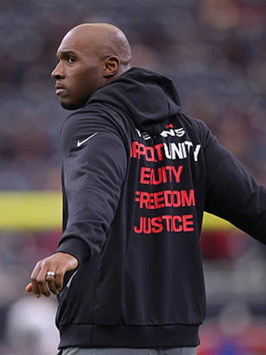 Houston Texans 2025 Inspire Change black Nike sideline pullover hoodie featuring Opportunity Equity Freedom Justice lettering