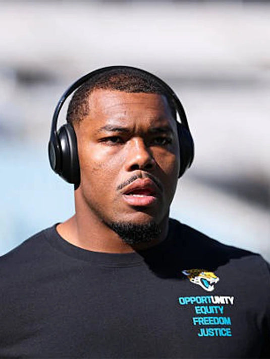 Jacksonville Jaguars 2025 Inspire Change black Nike long sleeve T-shirt featuring Opportunity Equity Freedom Justice lettering