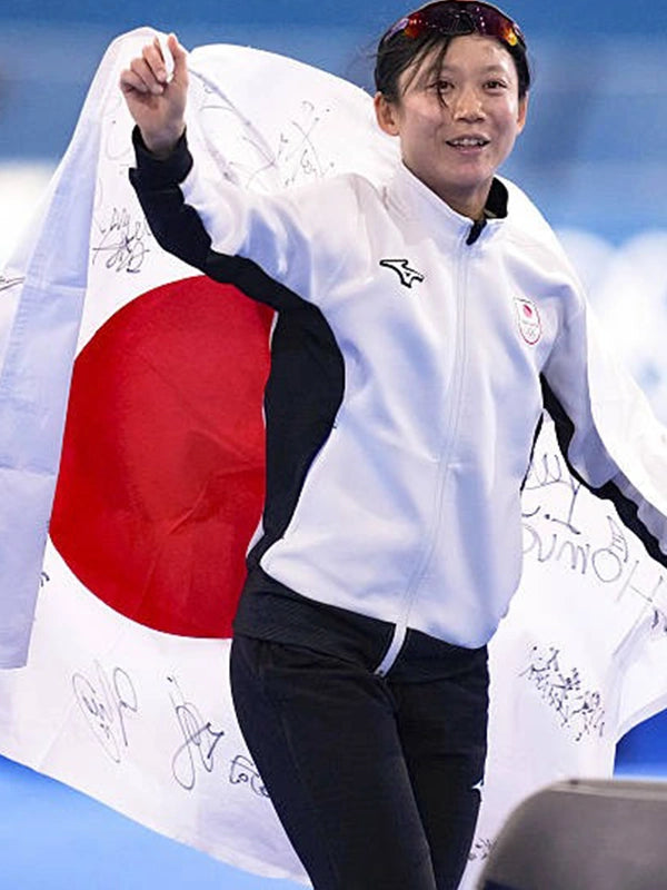 Kaori Sakamoto Milano Cortina 2026 Team Japan jacket in white and black with refined performance look and durable fabric