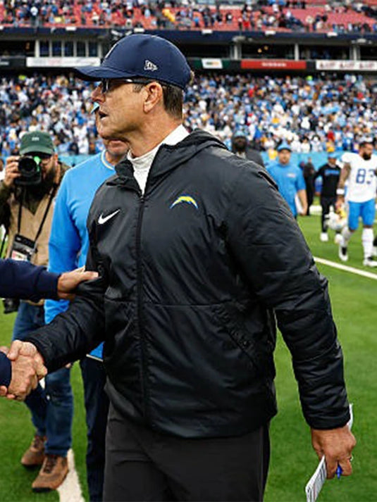 Jim Harbaugh Los Angeles Chargers Hooded Puffer Jacket in black with a sleek quilted design.