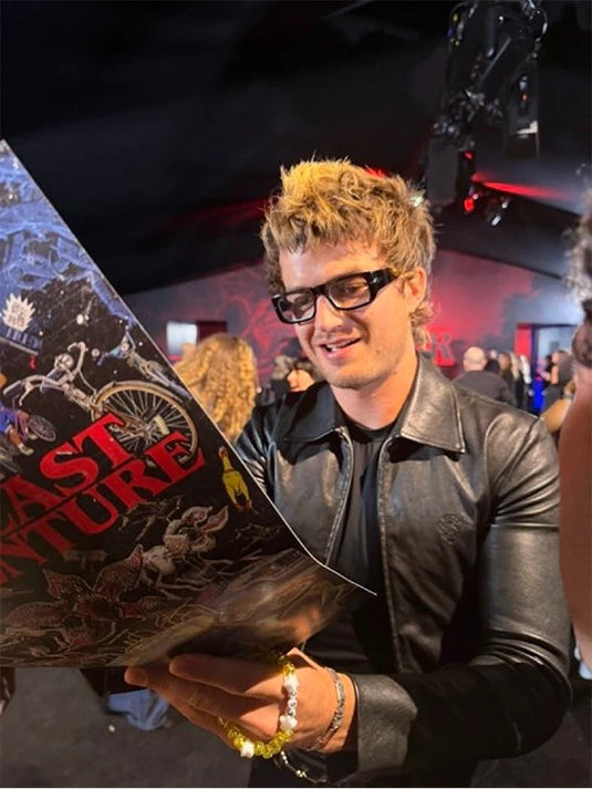 Joe Keery Stranger Things 5 premiere event leather jacket showcasing clean lines and a polished black sheen.