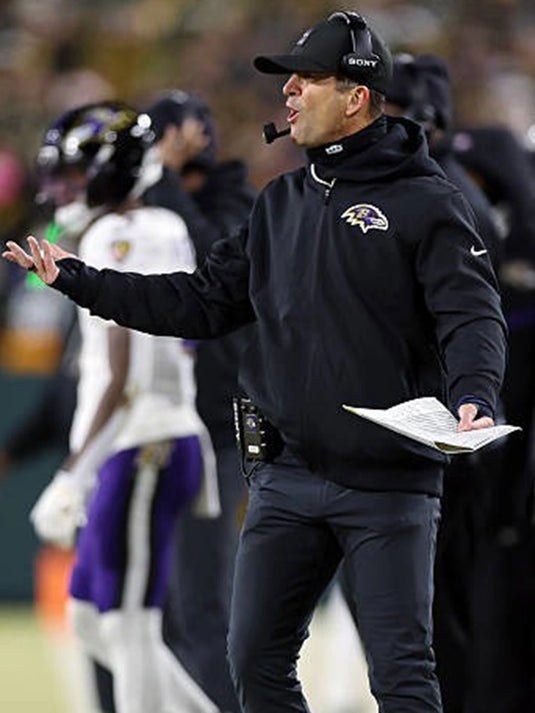 Recreated Coach John Harbaugh Baltimore Ravens black Nike sideline bomber jacket with clean athletic styling