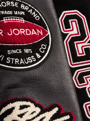 Recreated 2026 Levi’s Jordan varsity jacket in black with premium wool construction and leather sleeves