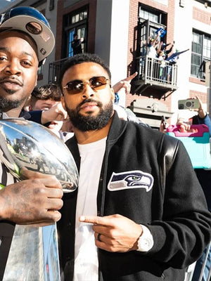 Recreated Julian Love Seattle Seahawks Super Bowl LX Champions parade wool varsity jacket in black with bold embroidered championship graphics
