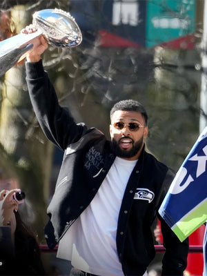 Seattle Seahawks Super Bowl LX champions wool varsity jacket in black with bold embroidered Seahawks emblem and celebratory accents