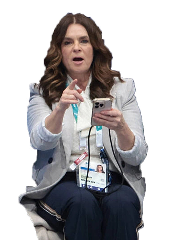 Off-white wool trench coat inspired by Katherine Witt at Milano Cortina 2026 Winter Olympics with classic long coat silhouette