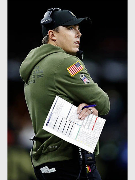 2025 New Orleans Saints Olive Green Fleece Hoodie inspired by Coach Kellen Moore’s sideline look and Salute to Service style.