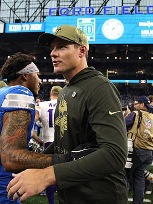 Kevin O’Connell Minnesota Vikings Olive Green Salute to Service Hoodie Tee with casual athletic style.