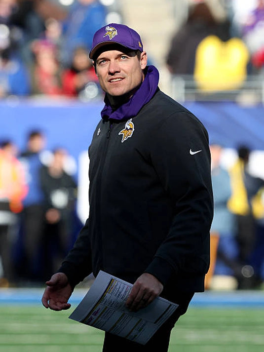 Recreated Minnesota Vikings black Nike sideline bomber jacket inspired by coach Kevin O'Connell for the 2025 season