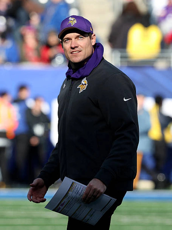 Recreated Minnesota Vikings black Nike sideline bomber jacket inspired by coach Kevin O'Connell for the 2025 season