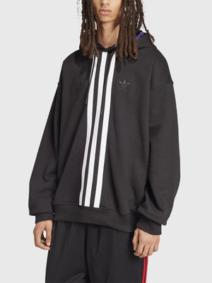 Korn x Adidas 2026 black striped pullover hoodie crafted with warm fleece material and roomy oversized silhouette