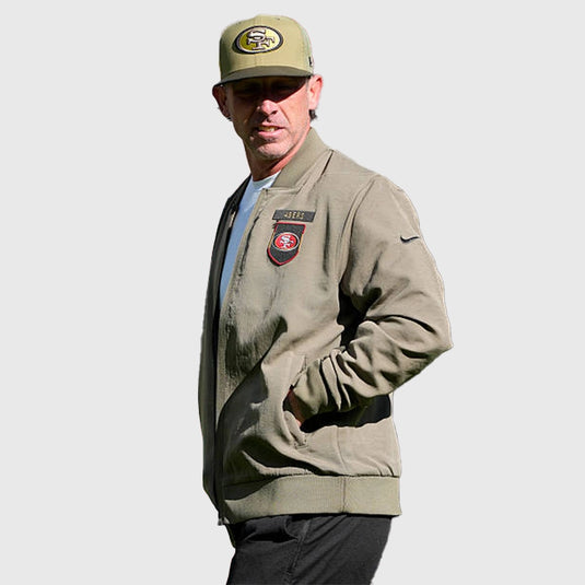 Olive green 49ers Salute to Service 2025 cotton bomber jacket designed for comfort and casual athletic wear.