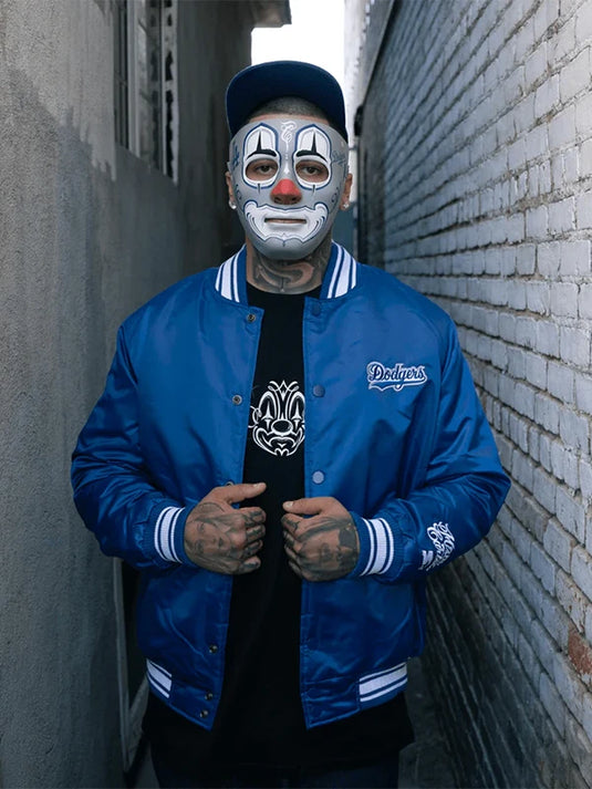 Recreation Dodgers x Mister Cartoon collaboration jacket in blue satin showcasing street-art influence and vintage flair.