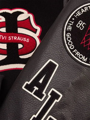 Recreated Levi’s x Jordan varsity jacket blending traditional wool fabric with bold leather sleeves