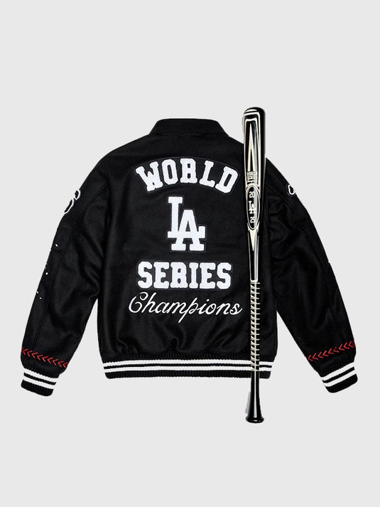 Dodgers 2025 Champions Full-Snap Varsity Jacket in black featuring bold graphics and structured silhouette.