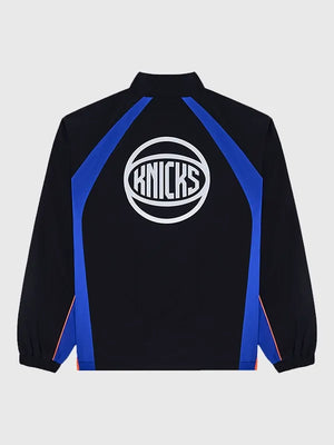 Recreated black New York Knicks Malbon 2026 quarter-zip jacket with streamlined silhouette and subtle branding