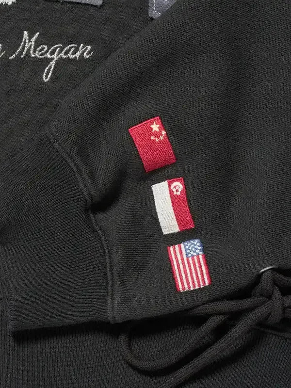 Cropped black hoodie with lace-detailed sleeves, RECREATED under Gap x Katseye 2026 Kat by Megan line with soft fleece build