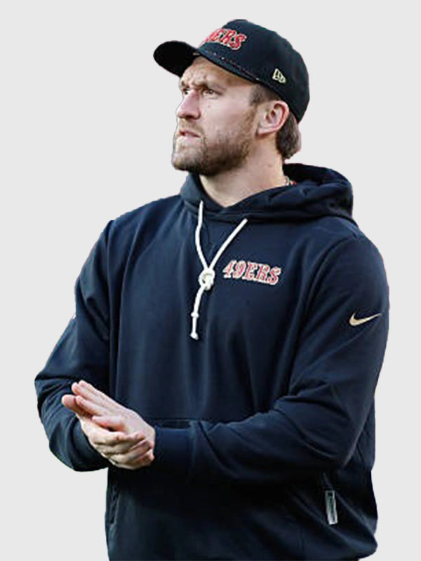 Black pullover hoodie recreated from the San Francisco 49ers 2025 Rivalries sideline collection with classic team style