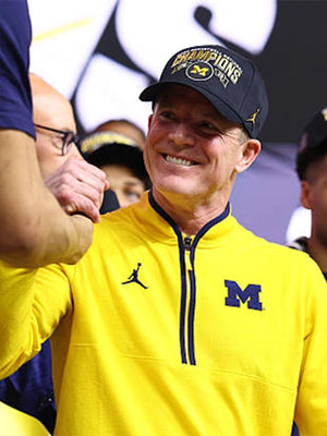 Yellow Michigan Wolverines quarter-zip Victory jacket recreated with lightweight construction and modern performance styling